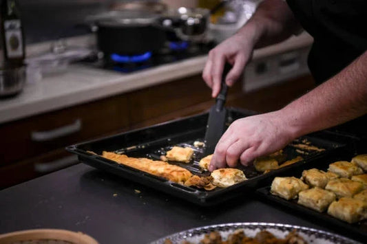 Preparing baked pastries for a quick Shabbos meal