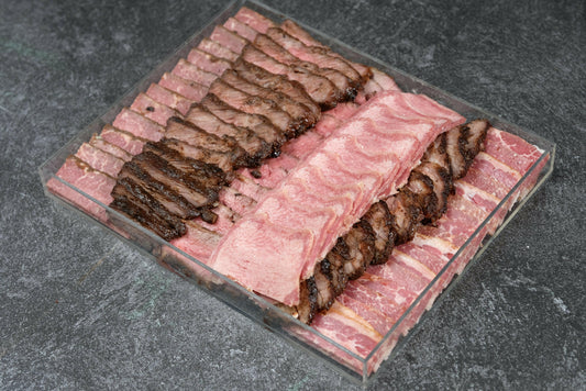 10-inch acrylic tray featuring an assortment of sliced Glatt Kosher cooked meats including brisket and tongue from Satmar Meats.